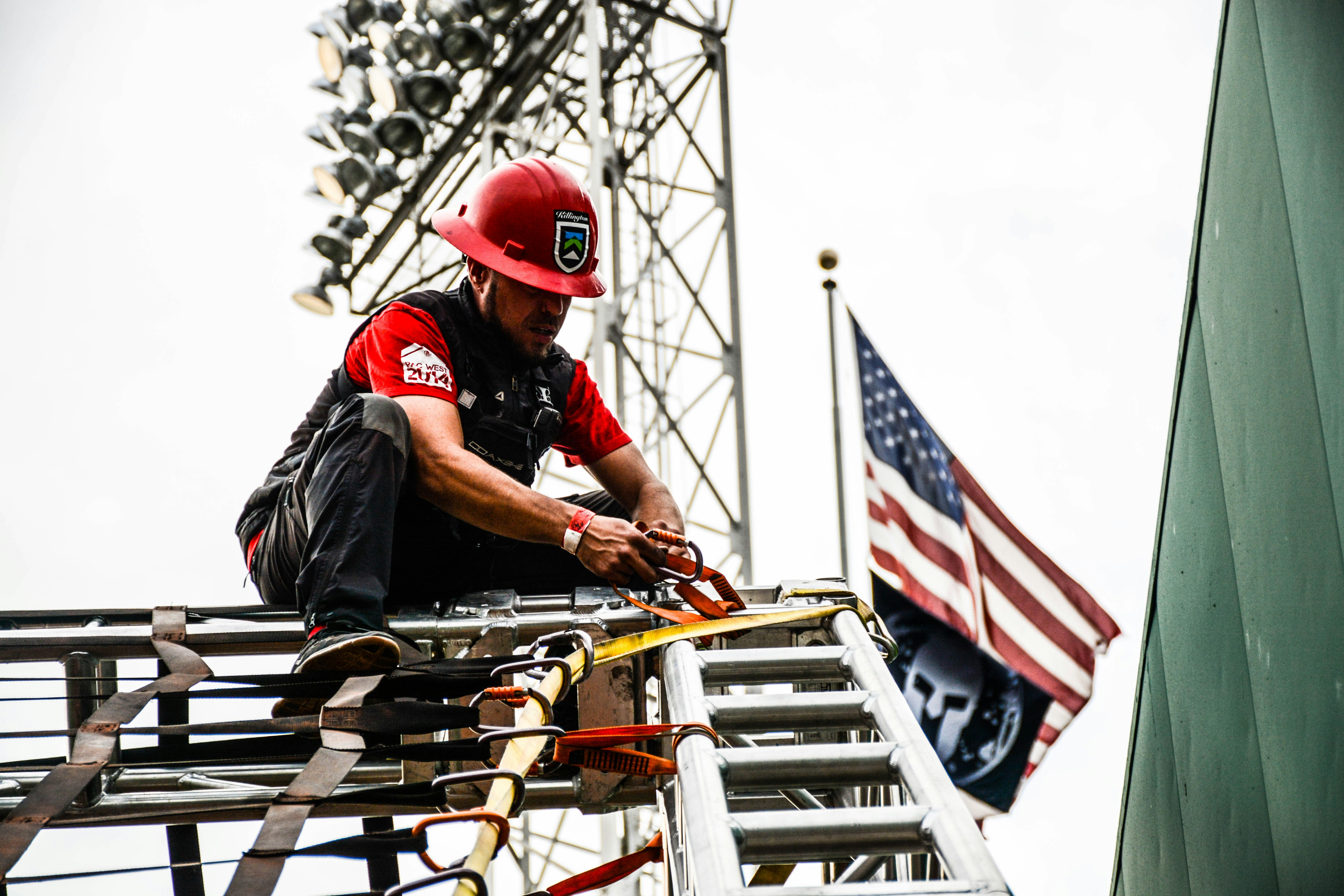 Technician working on a telecom tower